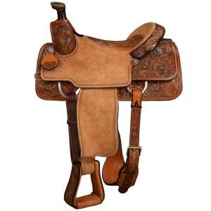 A team roping western saddle featuring leather tooled vines with a suede and roughout customizable seat and personalized silver conchos